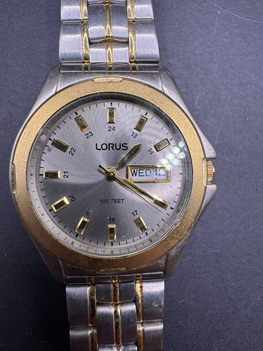 Lorus LR0237 Two-Tone Wristwatch Silver Dial Day Date 100 Feet Water Resistant